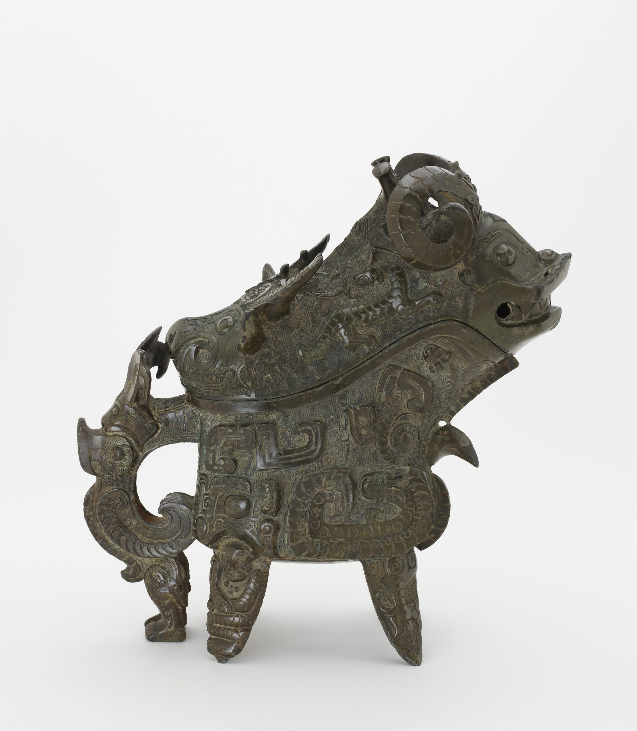 metalwork pouring vessel made up of a combination of animal characters