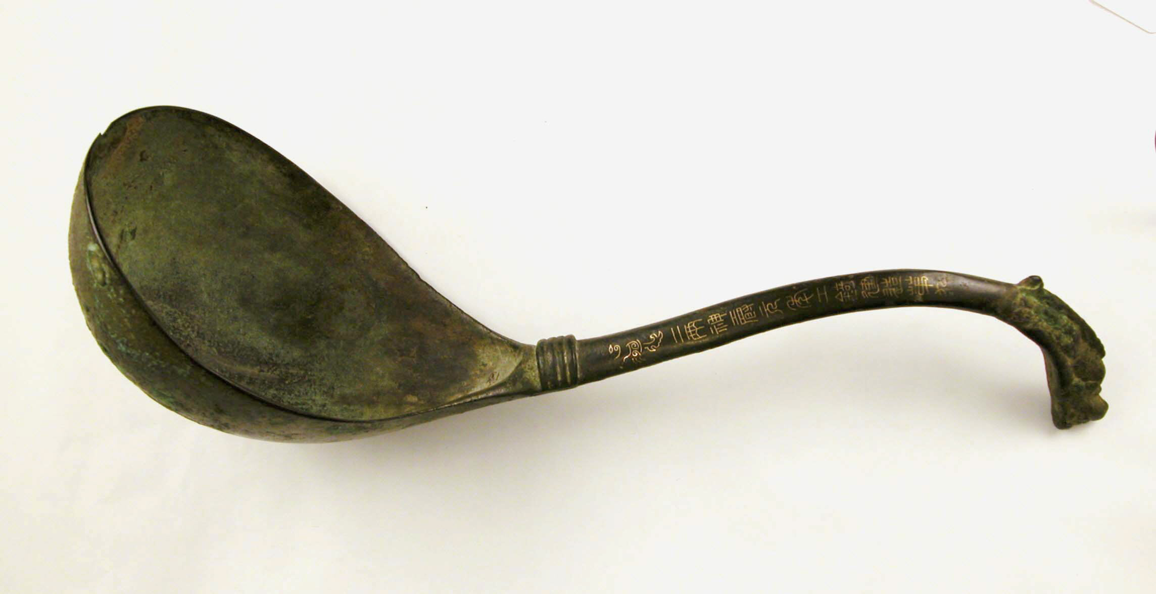 metal ladle with long handle